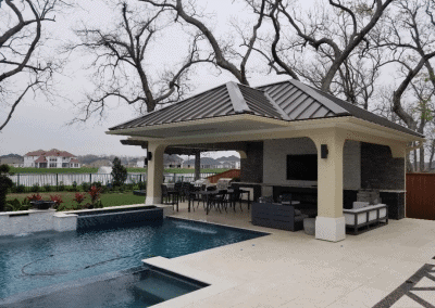 pergola with metal roof with grill area in sugar land tx