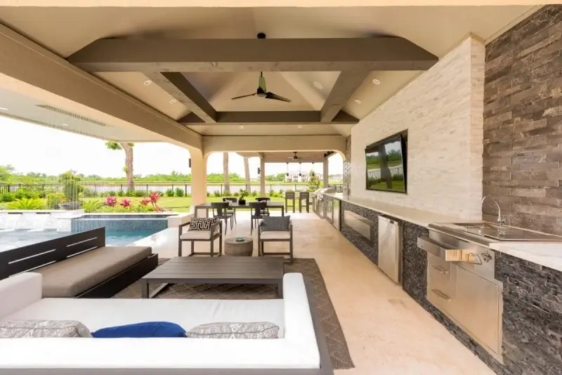 pergola with fireplace and seating in houston