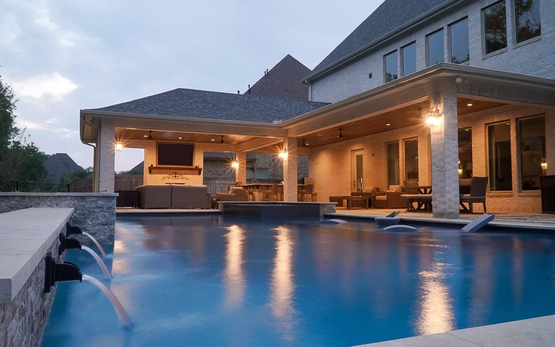 a covered patio and outdoor living area